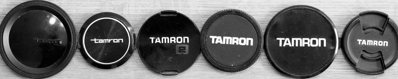 6 Tamron lens caps from different eras